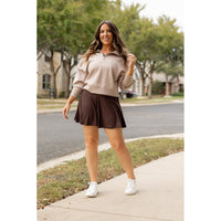 Stretchy brown Julia Rose skort styled for casual wear