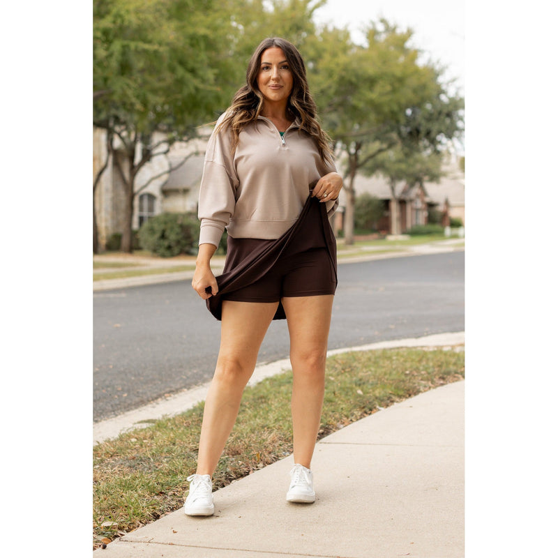 Stretchy brown Julia Rose skort styled for casual wear