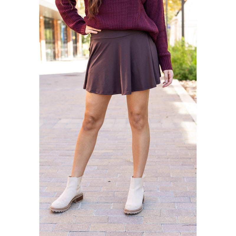 Stretchy brown Julia Rose skort styled for casual wear