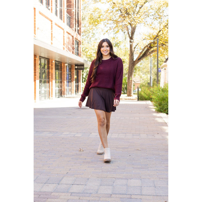 Stretchy brown Julia Rose skort styled for casual wear